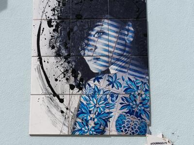 Azulejo Portrait with Ink Splashes — Street art by O Gringo in Lisboa