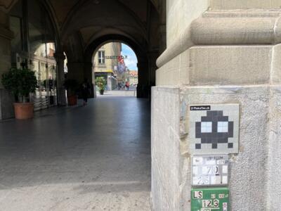 BRN_11, Space Invader on Schmiedenplatz 1–5 — Street art by Invader in Bern