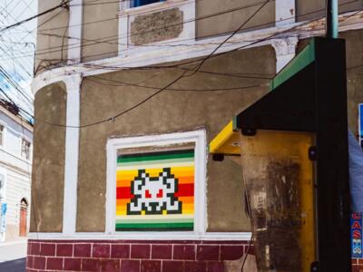 POTI_49, Space Invader on Calle Oruro — Street art by Invader in Potosí