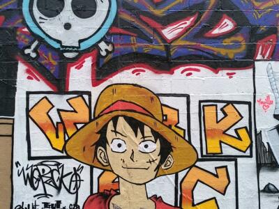 Luffy au chapeau de paille et Jolly Roger — Street art à Reims