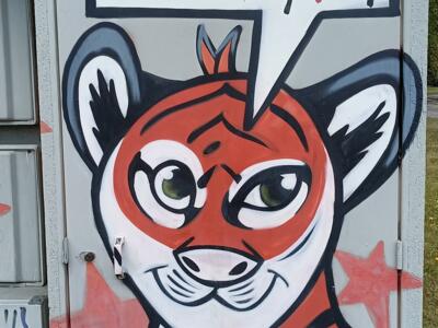 Ginger tiger cub of L'Antre des Lynes — Street art in Yffiniac