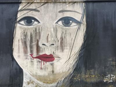 Portrait with a scarlet mouth — Street art in Lisboa