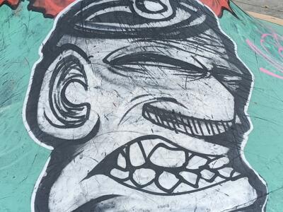 Spray-Can Head on the Ursulines Ramp — Street art in Bruxelles