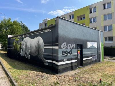 An Unequal Fight - Rhino vs Car in Komín — Street art by Malujeme Jinak in Brno