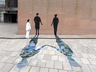 Caress — Street art by Pejac in Santander