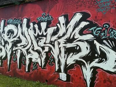 Black and white lettering on red — Street art in Nantes