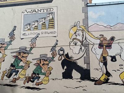 Lucky Luke and the Daltons by Morris — Street art by Morris in Bruxelles