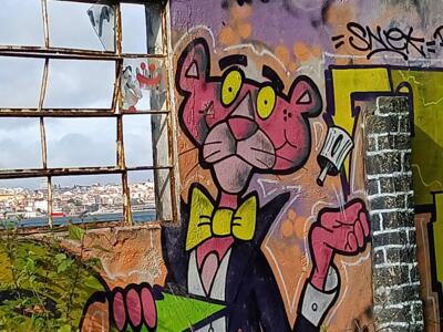 Pink Panther in a Tuxedo in the Ruin — Street art in Lisboa