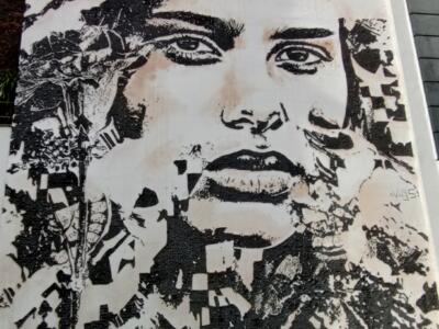 Visage gravé dans le mur par Vhils — Street art de Vhils à Bruxelles