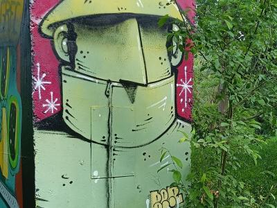 Character with a Yellow Hat — Street art in Rezé