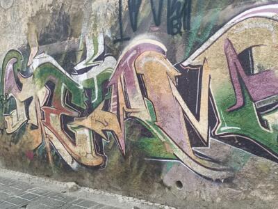 Weathered Green and Ochre Lettering — Street art in Almada