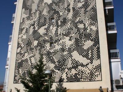 Albufera 76 — Street art de Sten Lex à Madrid