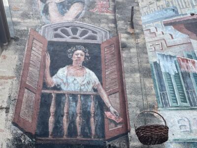 Woman in Hair Curlers on the Balcony — Street art in Kuala Lumpur