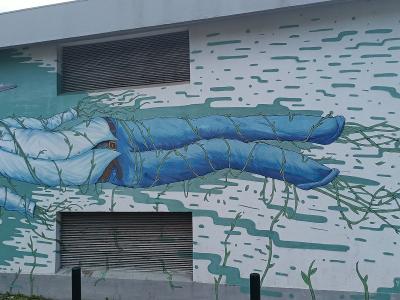 Figure à Tête de Corbeau et Lierres — Street art de Oze Arv à Lisbon