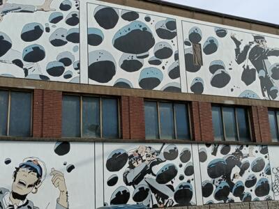 Corto Maltese, shootout on pebbles — Street art by Hugo Pratt in Bruxelles