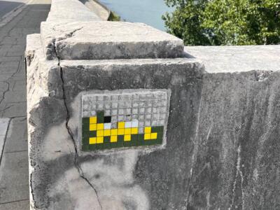 GRN_01, Space Invader on 1–7 Quai Créqui — Street art by Invader in Grenoble