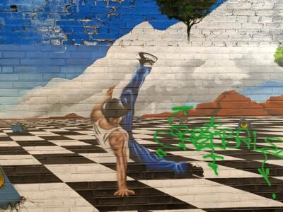 Breakdancer on the checkerboard — Street art by Goodlack Art in Köln
