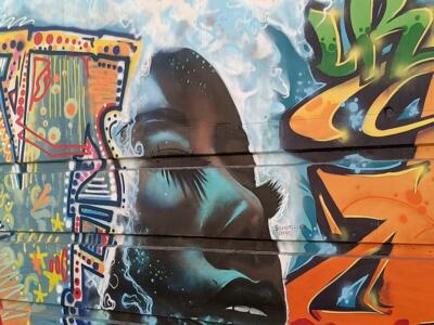 Closed-Eyed Face in the Smoke — Street art in Marseille