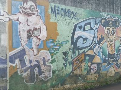 Mickey Poison et Crâne — Street art à Lisbon