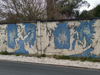 Acrobats stepping out of the concrete — Street art in Lisboa