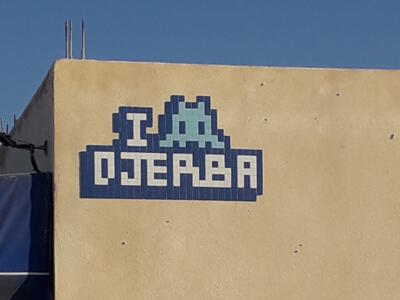 DJBA_52, Space Invader on R109 Mellita — Street art by Invader in Houmt Souk