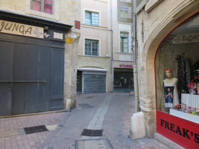 NIM_03, Space Invader on 2 bis Plan de l'Aspic — Street art by Invader in Nîmes
