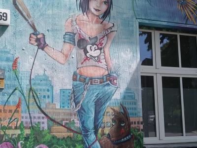 Facade with Manga Girl and Owl — Street art in Berlin