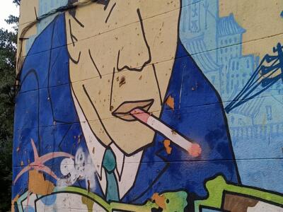 Man in a suit with a cigarette — Street art in Marseille