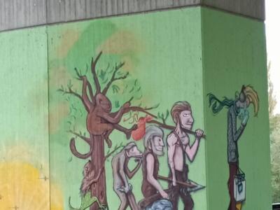 Evolution mural under the viaduct — Street art in Erkrath