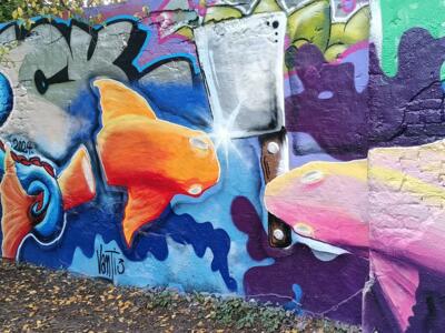 Poissons rouges et pieuvre au chapeau — Street art à Düsseldorf