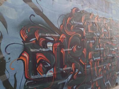 Red and Black Wildstyle in Flames — Street art in Marseille