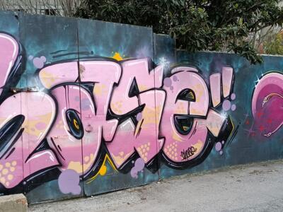 Pink Bubble Letters on Turquoise — Street art in Almada