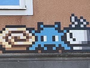 LAP_26, Space Invader on Storgatan — Street art by Invader in Jokkmokk