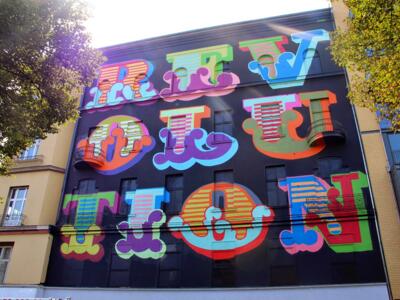 Revolution — Street art by Ben Eine in Berlin