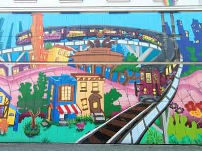 Ville fantastique au chat orange — Street art à Berlin