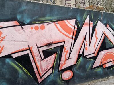 Salmon Pink Lettering and Worker in a Yellow Helmet — Street art in Almada