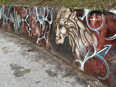 The Chimera and the Lion — Street art by Maria Angelica Mazzulli in Aielli Stazione