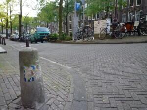 AMS_05, Space Invader on 53A Bloemgracht — Street art by Invader in Amsterdam