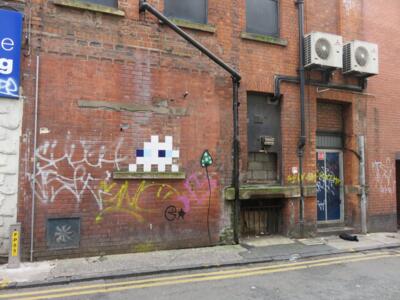 MAN_45, Space Invader on 11 Oldham Street — Street art by Invader in Manchester