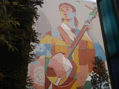 The Shamisen — Street art by Aryz in Tokyo