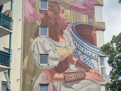 Her Size, Her World — Street art by Tima in Valence