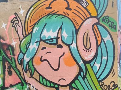 Girl in an orange beanie by Kitsa — Street art by Kitsa in Marseille