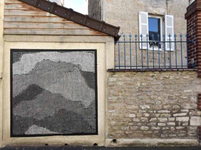 Screened landscape on Rue du Milieu — Street art by Sten Lex in Caen