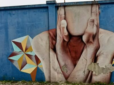 Geometric stars and a veiled torso — Street art in Lisboa