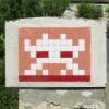TLS_02, Space Invader de la route de Monfort — Street art de Invader à Mauvezin