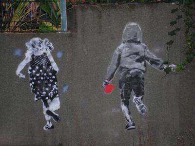 A girl and a boy with a heart — Street art in Rennes