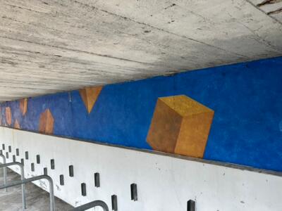 3D ocre sur bleu — Street art à La Chaux-de-Fonds