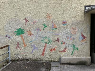 Faded Beach Scene on Rue du Progrès — Street art in La Chaux-de-Fonds