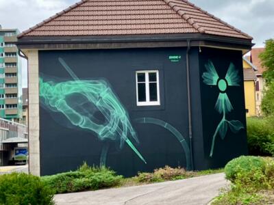 Radium — Street art by SHOK-1 in Le Locle
