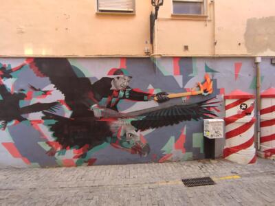 L'homme au flambeau sur un vautour — Street art à València